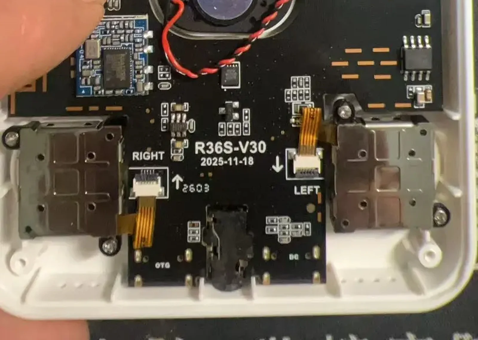 A V30 sample board, bottom edge, showing the two connectors silkscreened OTG and DC plus the battery plug in the middle