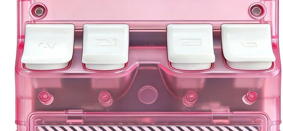 Close-up of the rear shoulder buttons on a pink supplier sample
